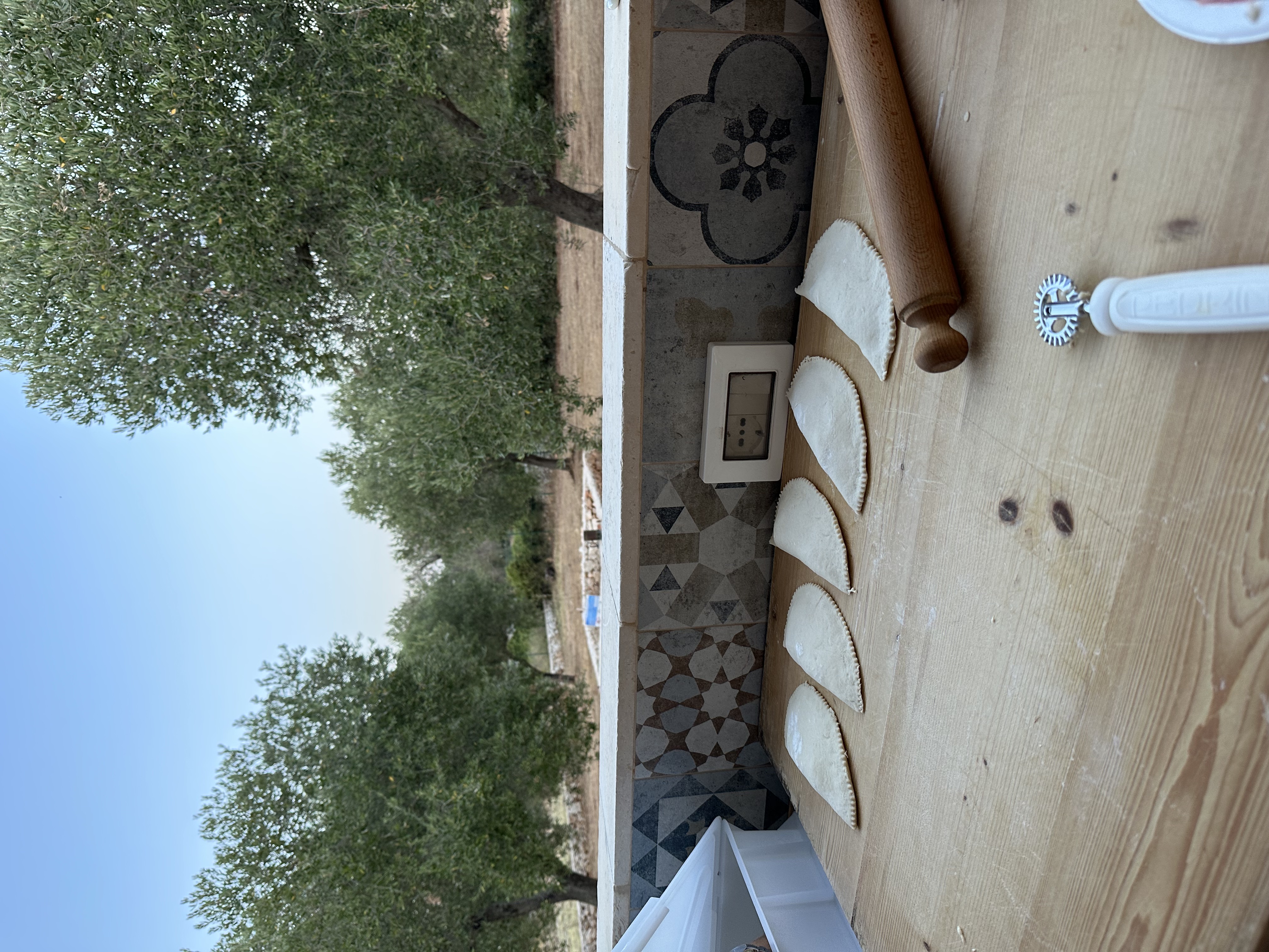 A private chef preparing a meal in the villa's kitchen